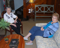 McPeak's residents Leonarda Kulakowski (left) and Doris Smith (right) relax in the lounge.